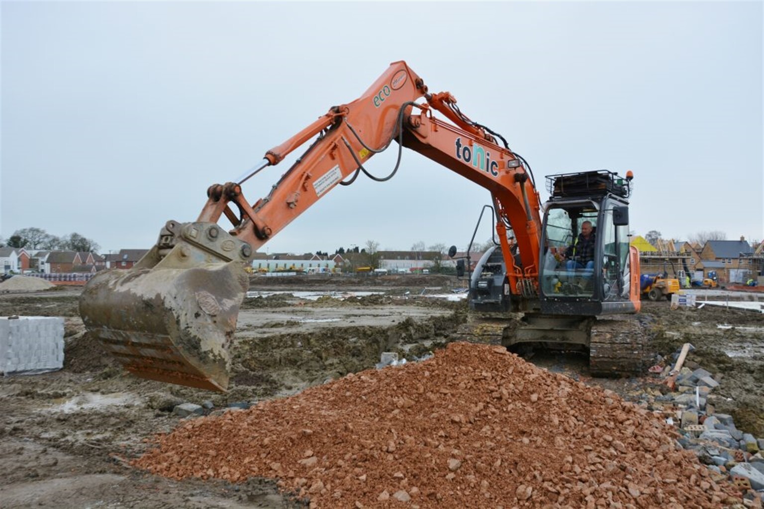 Hitachi short radius excavators star for Tonic Construction